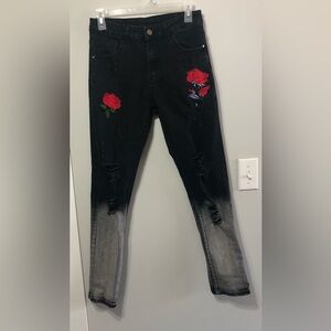 Black and gray men’s jeans with roses size 30.